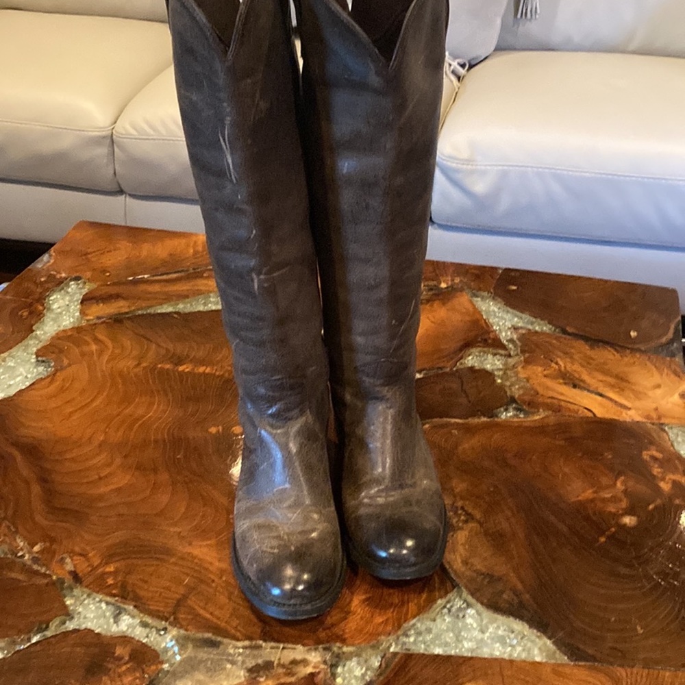 Riding boots size 6- color is a greish brown. Minor scratches but good condition